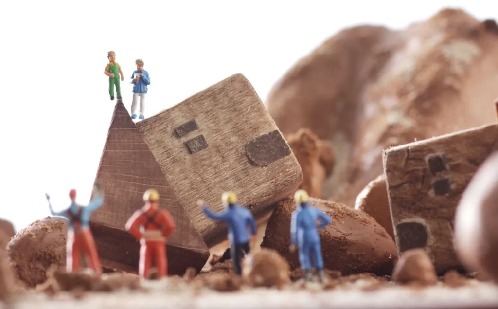 Ilustrasi sebuah rumah yang retak akibat gempa bumi.