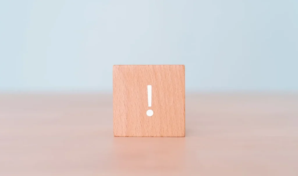 Tanda seru yang melambangkan peringatan atau hal yang perlu diperhatikan.