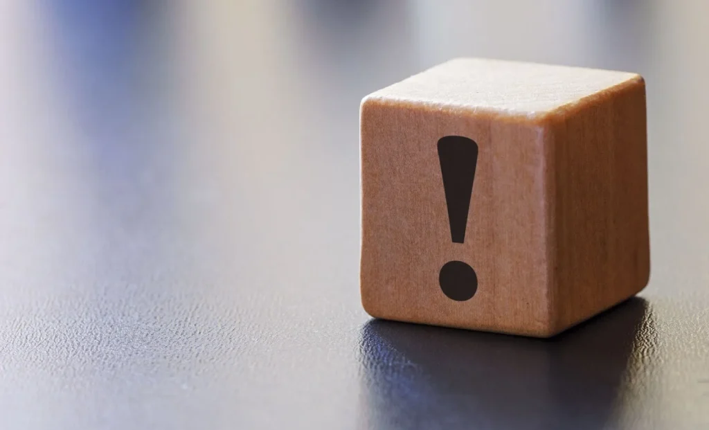 Tanda seru yang melambangkan peringatan atau hal yang perlu diperhatikan.