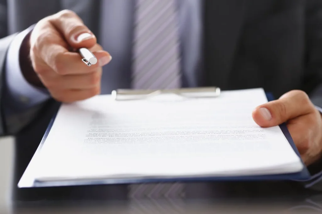 Sebuah dokumen resmi dengan stempel perusahaan.